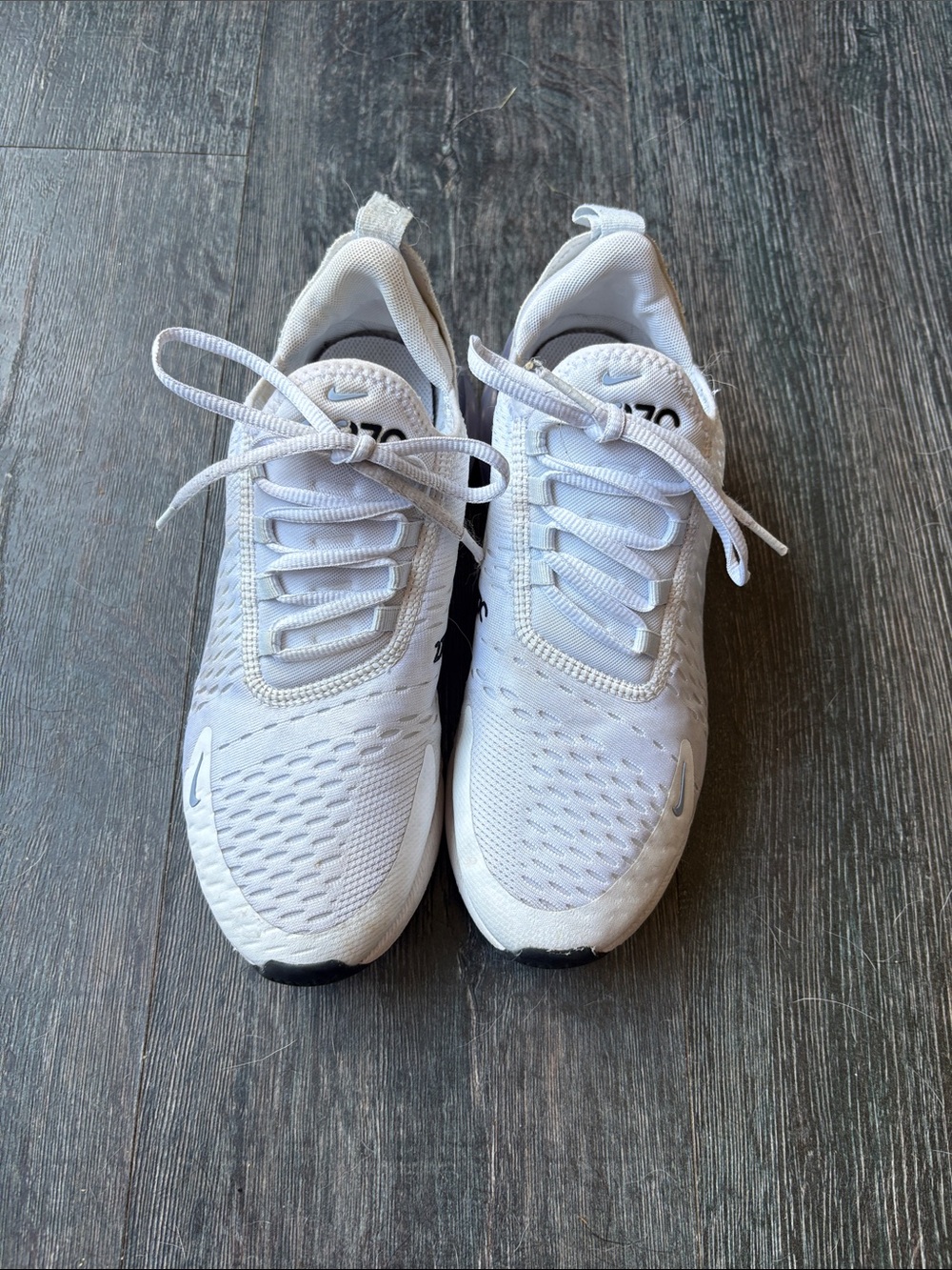 Nike White womens Sneakers with Subtle Black Accents